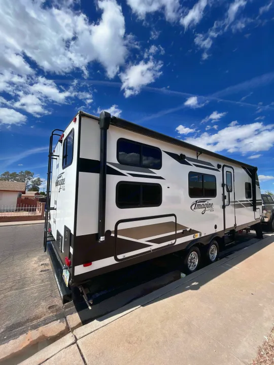 Grand Design Imagine XLS rear and side exterior with awning