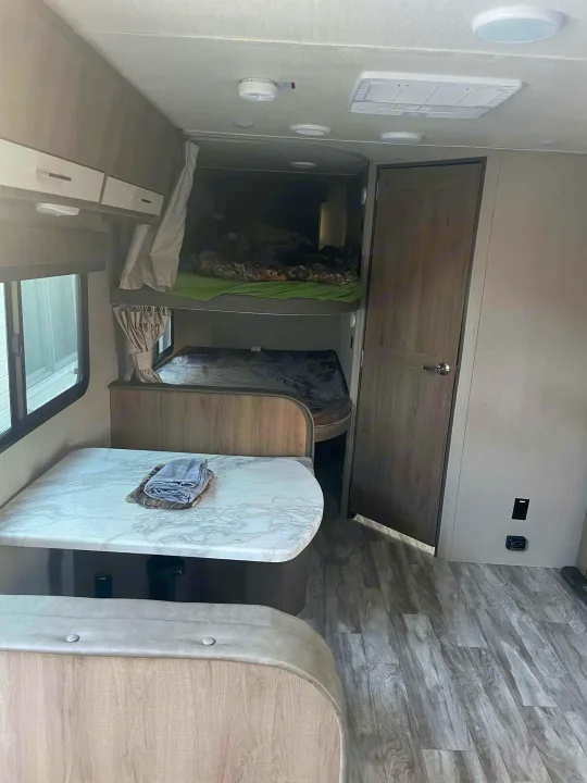 Grand Design Imagine XLS bunk and dinette area